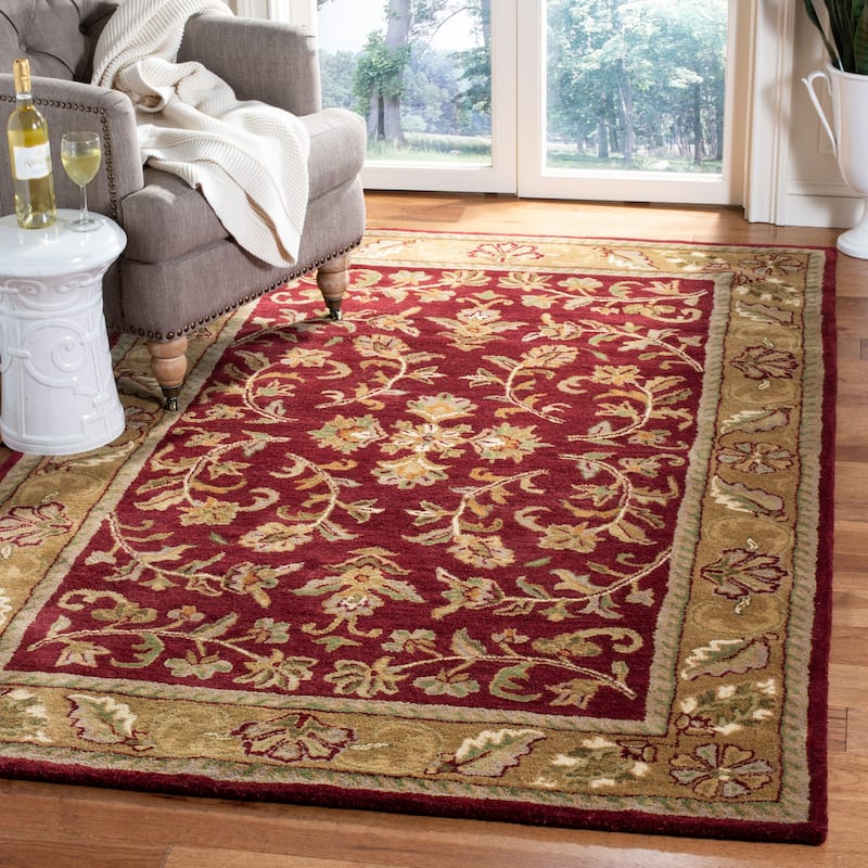 SAFAVIEH Handmade Heritage Gullu Traditional Oriental Wool Rug - 6' x 9' - Red/Gold