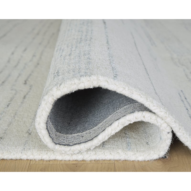 Signature Design by Ashley Genemost Beige/Blue Area Rug