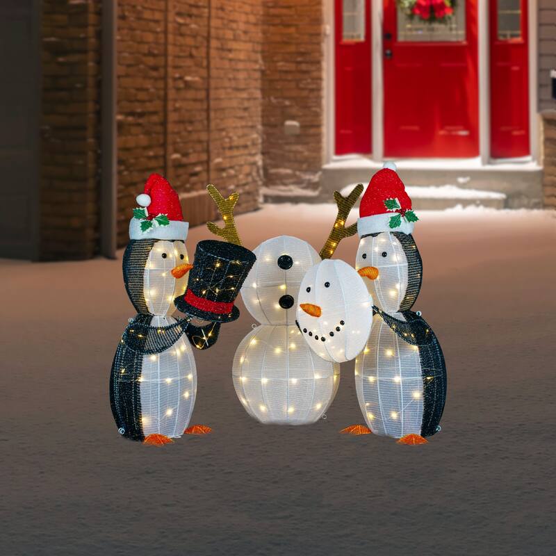 Set of 3 LED Lighted Penguins Building Snowman Outdoor Christmas Decoration 35"