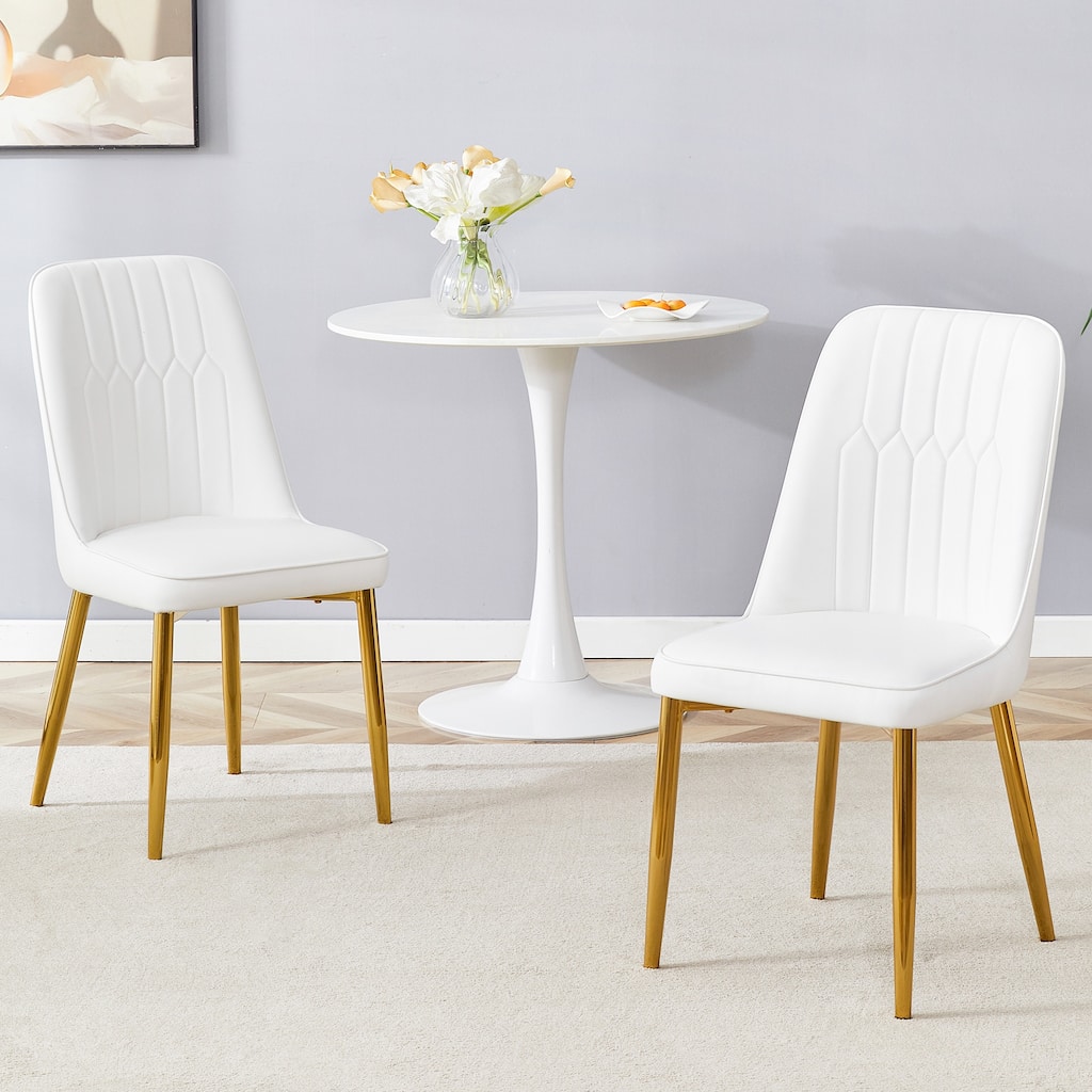 2 modern dining chairs, sleek PU leather backrest, and gold metal legs bring a comfortable home experience to the kitchen