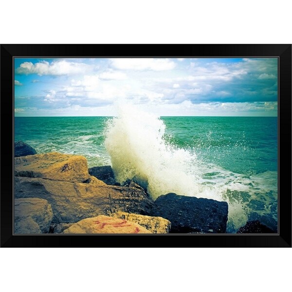 "Wave smashing on rock." Black Framed Print