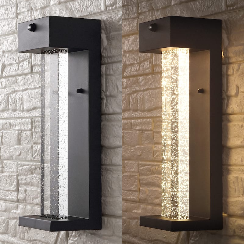 Horizone 5.13" 1-Light Modern Iron/Seeded Glass with Dusk-to-Dawn Sensor Integrated LED Outdoor Sconce, Black by JONATHAN Y