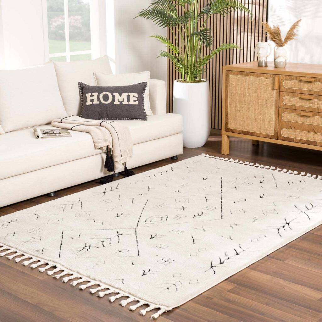 Hauteloom Shag Farmhouse Tasseled Cream & Black Area Rug