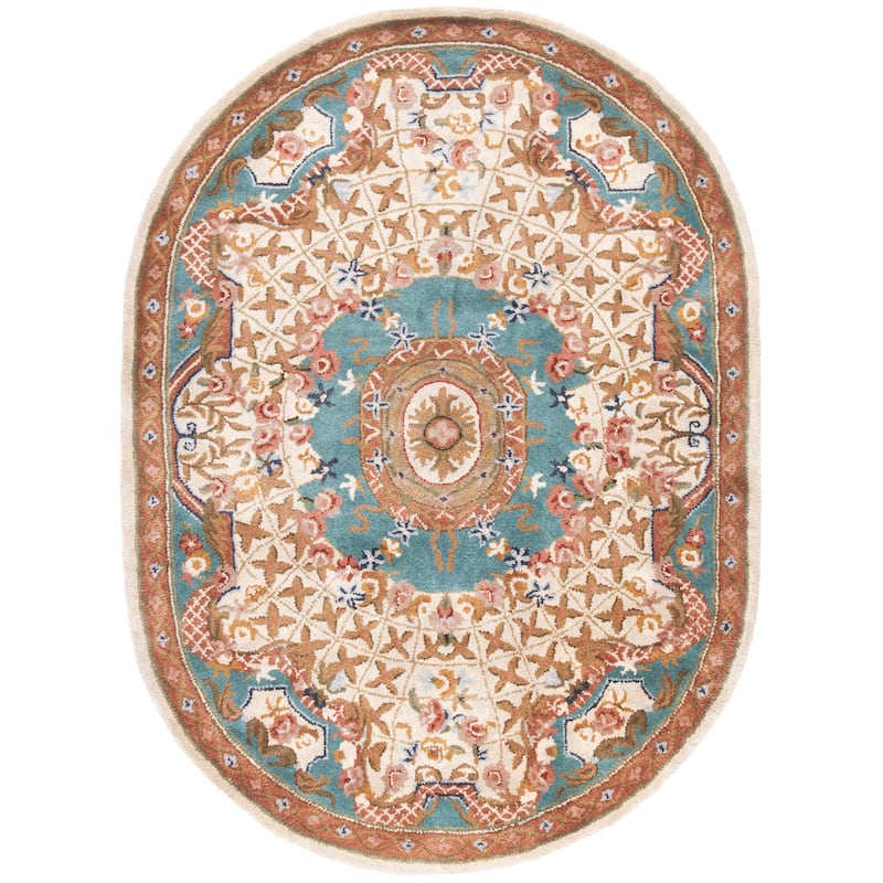 SAFAVIEH Handmade Classic Traiana Traditional Oriental Wool Rug - 4'6" x 6'6" Oval - Ivory/Light Blue