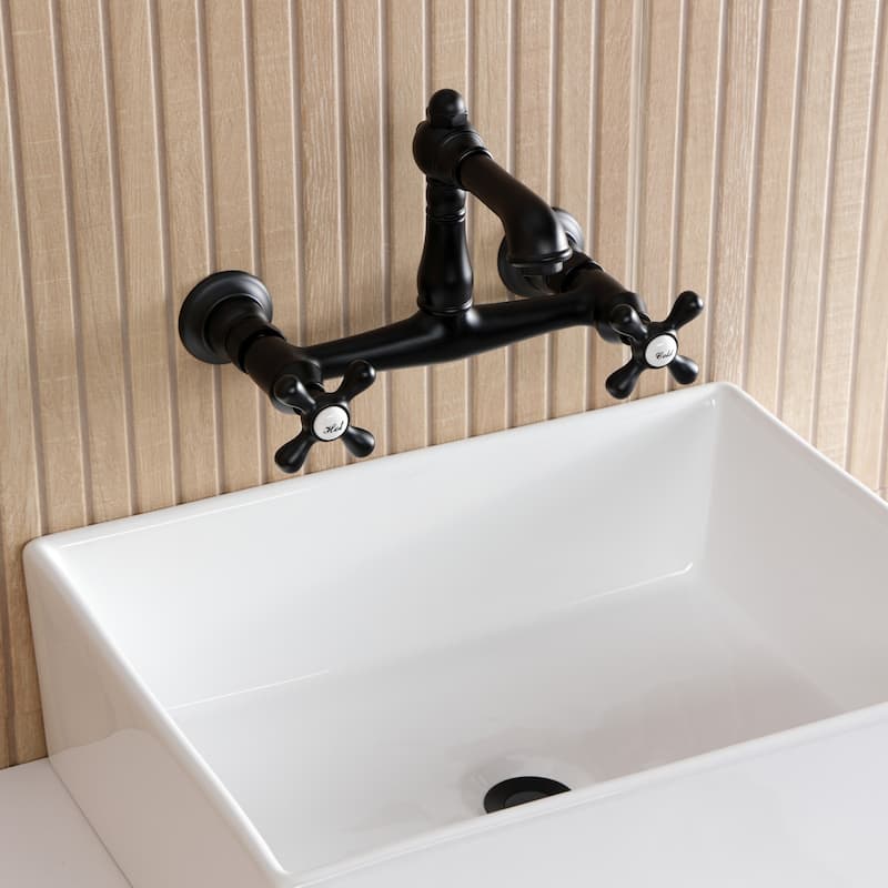 Kingston Brass English Country Two-Handle 2-Hole Wall Mount Bathroom Faucet