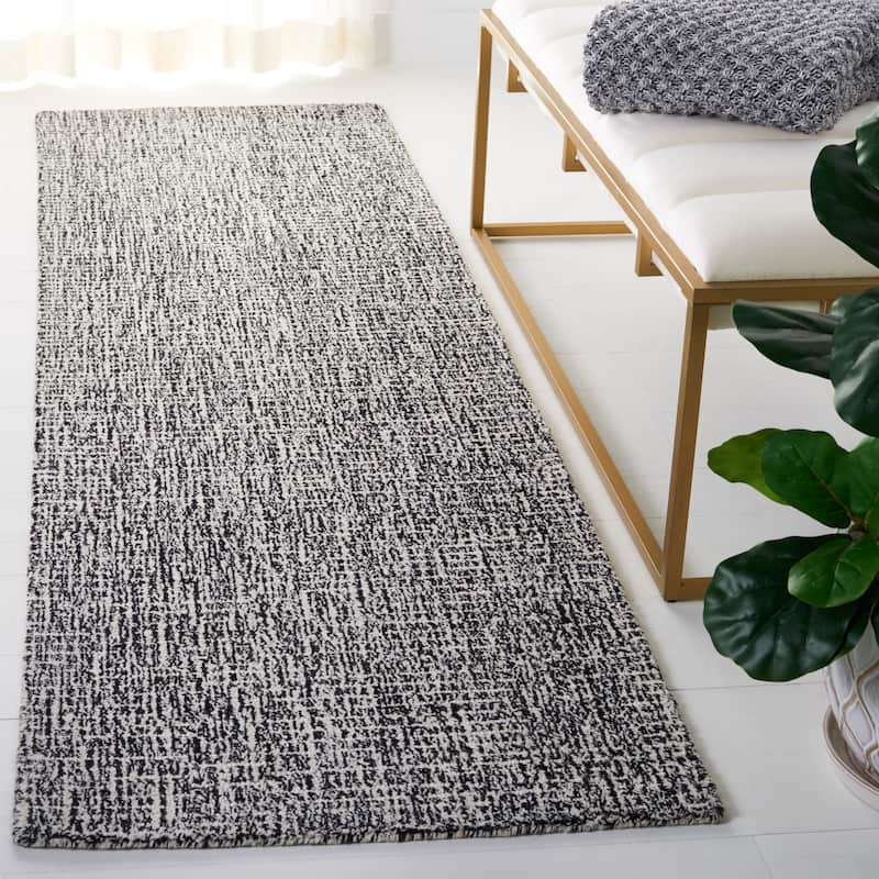 SAFAVIEH Handmade Abstract Lottie Modern Wool Rug - 2'3" x 6' Runner - Black/Ivory - Runner
