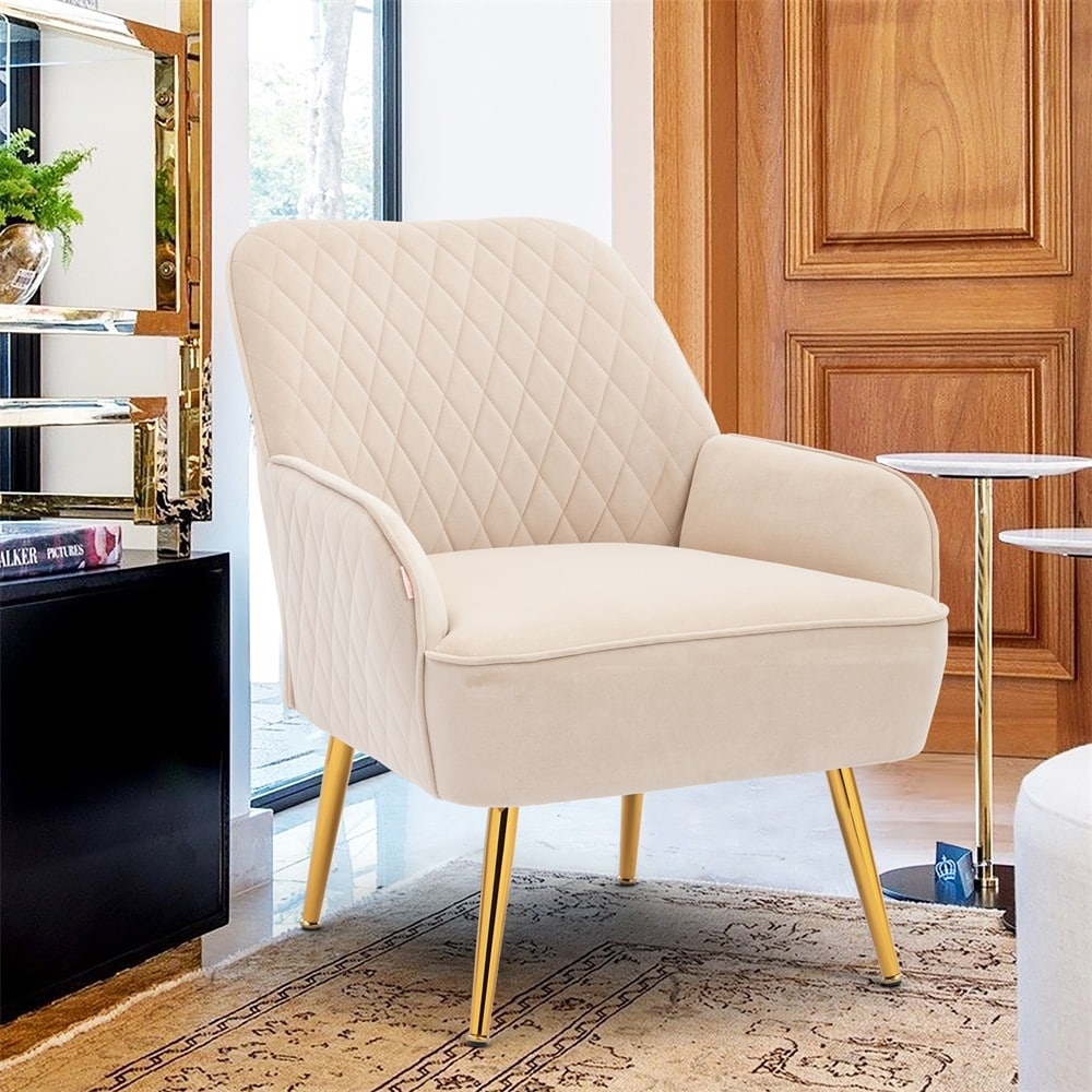 Beige/cream quilted armchair with gold legs