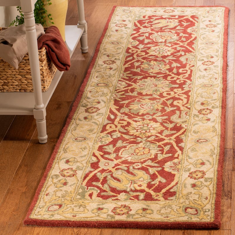 SAFAVIEH Handmade Antiquity Zuriñe Traditional Oriental Wool Rug - 2'3" x 12' Runner - Rust