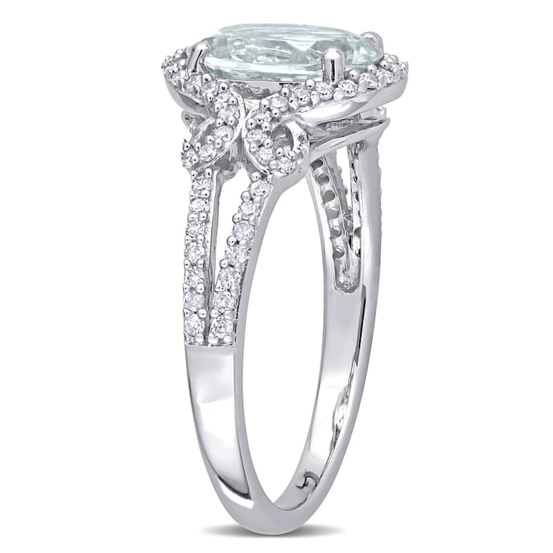 Miadora 10k White Gold Oval-cut Aquamarine and 1/3ct TDW Diamond Halo Split Shank Engagement Ring