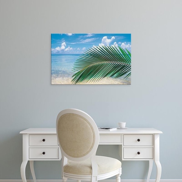Easy Art Prints Panoramic Images's 'Close up of palm leaf with sea in background' Premium Canvas Art