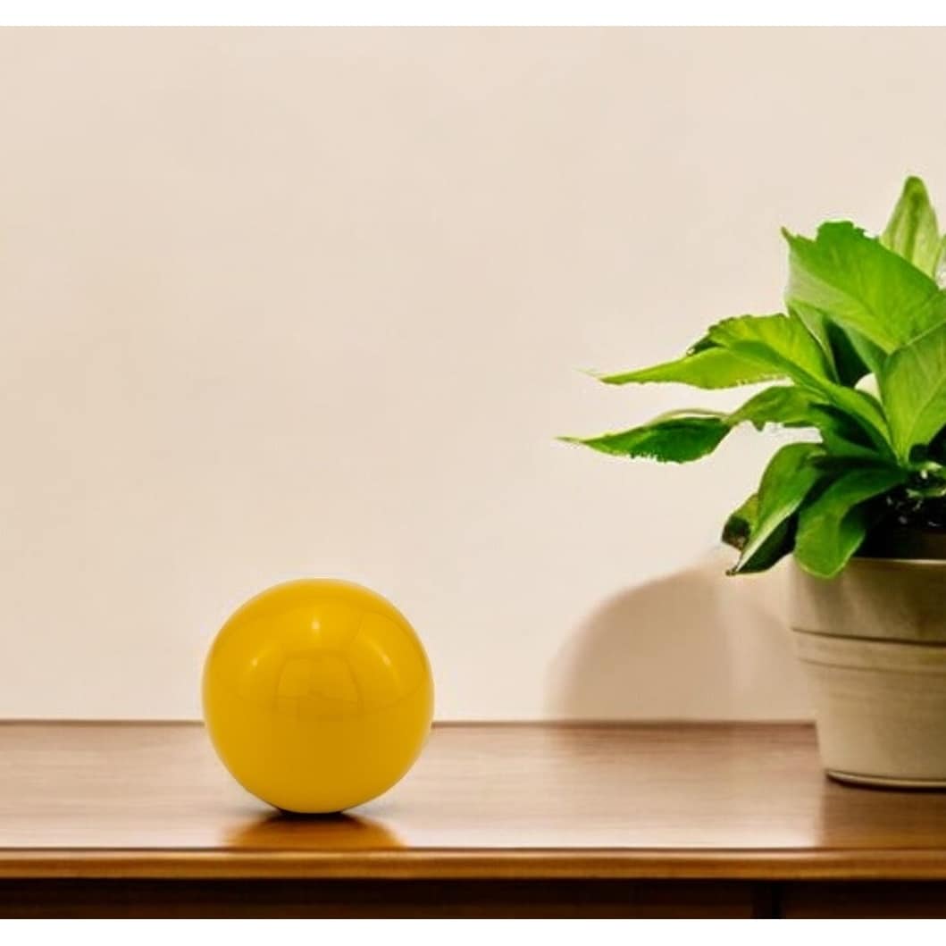 HomeRoots 3" Yellow Metal Decorative Orb - 3' X '3' X '3