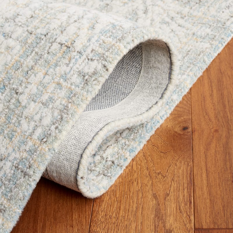 SAFAVIEH Handmade Ebony Fridbjorg Modern Wool Rug