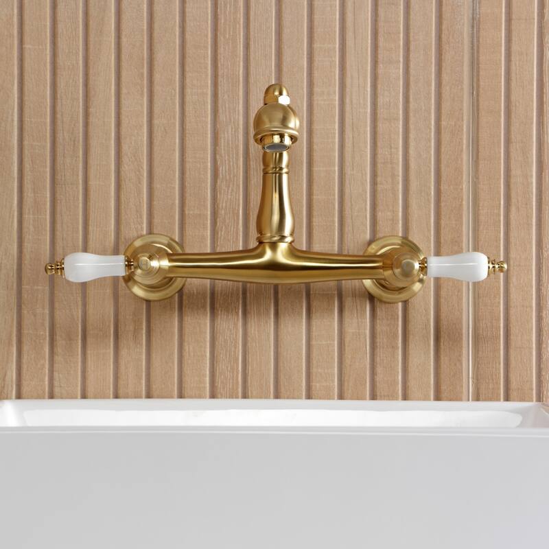 Kingston Brass English Country Two-Handle 2-Hole Wall Mount Bathroom Faucet