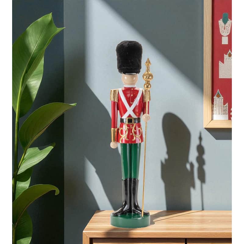 HomeRoots 19" Black Red And Green Resin Christmas Nutcracker Tabletop Sculpture - 4.75 in. x 19.00 in. x 4.00 in. - 4.75 in. x 19.00 in.  x 4.00 in.