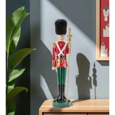HomeRoots 19" Black Red And Green Resin Christmas Nutcracker Tabletop Sculpture - 4.75 in. x 19.00 in. x 4.00 in.