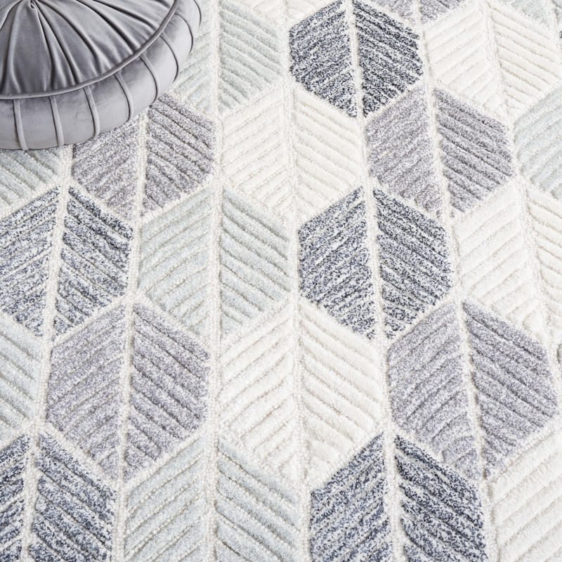 SAFAVIEH Handmade Ebony Sidonie Modern Wool Rug