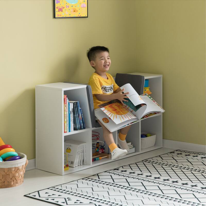 Modern Bookshelf with Storage Space and Gray Cushioned Reading Nook
