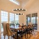 preview thumbnail 9 of 8, Rezz Black LED Wagon Wheel Two-Tier Round Large Chandelier - 33.86 in. W x 42.52 in. H x 33.86 in. D