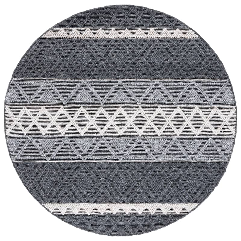 SAFAVIEH Handmade Natura Bilyana Wool Braided Tassel Rug
