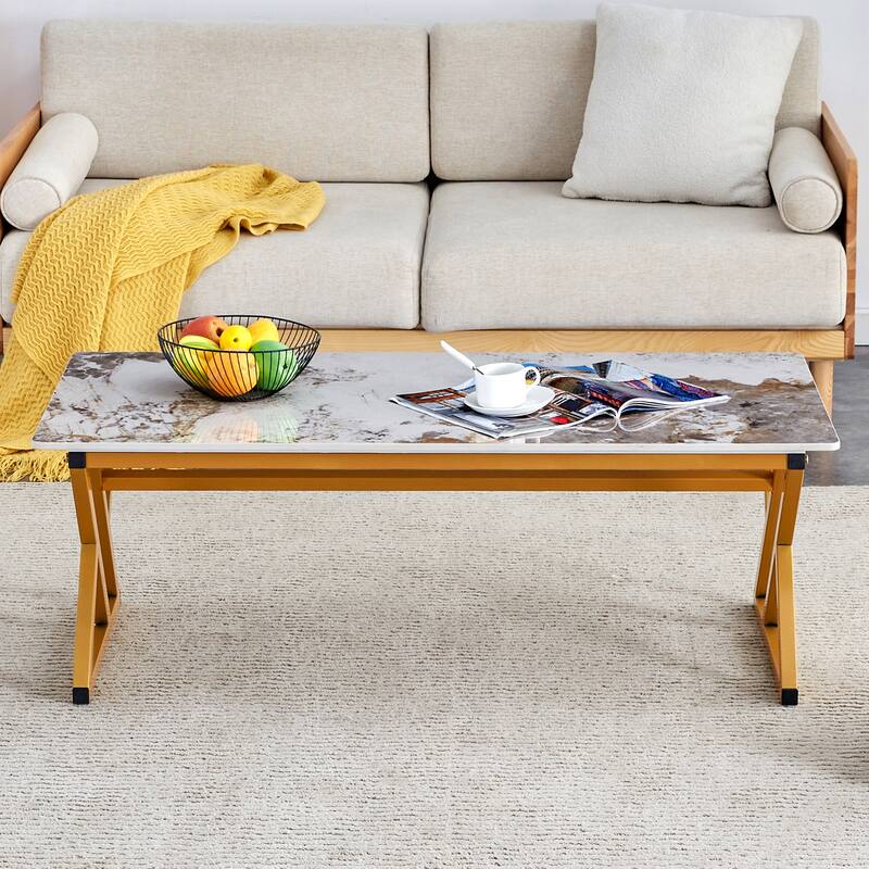 A modern minimalist style marble patterned coffee table with golden metal legs Computer desk Game table Tea table