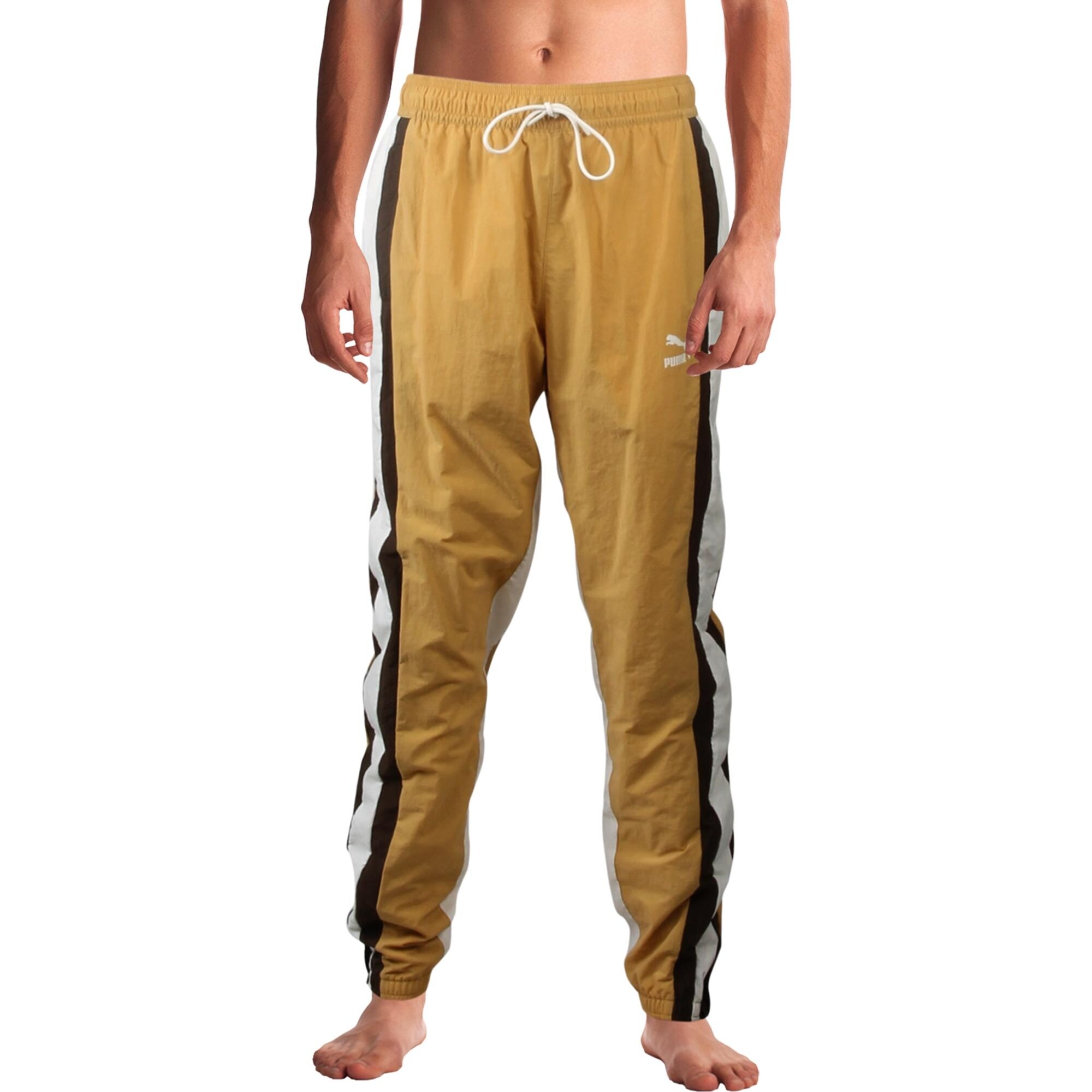 mustard track pants