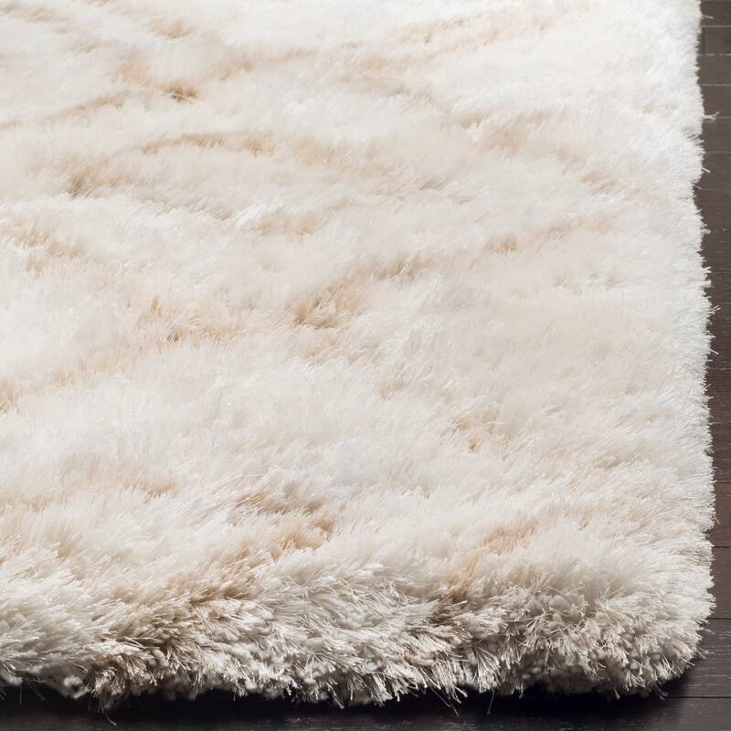 SAFAVIEH Handmade Toronto Shag Delaney Polyester Rug