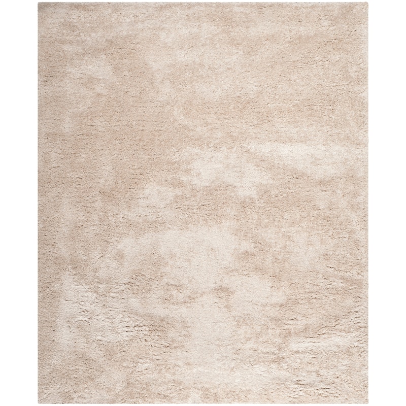 SAFAVIEH Handmade South Beach Leonella Shag Solid Polyester Rug
