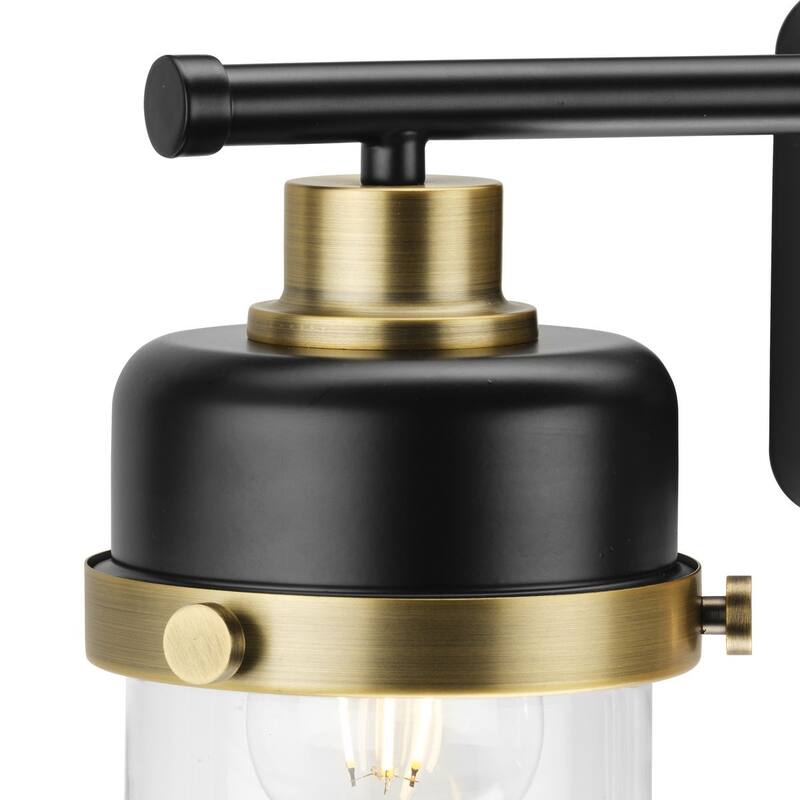 Beckner Collection Three-Light Matte Black Clear Glass Urban Industrial Bath Light with Vintage Brass Accents