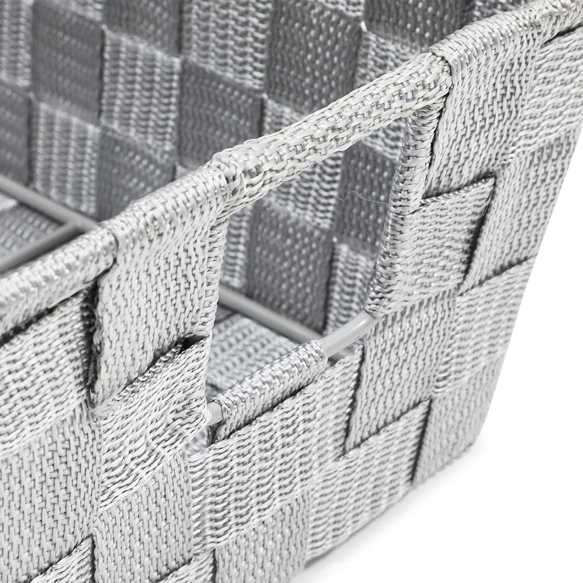 https://ak1.ostkcdn.com/images/products/is/images/direct/169722d7415f852f95d10d32fc82cc3e076bd5ac/Farmlyn-Creek-Grey-Woven-Basket-for-Bathroom%2C-Closet-and-Pantry-Storage-%2811.4-x-6.5-x-4.5-in%29.jpg