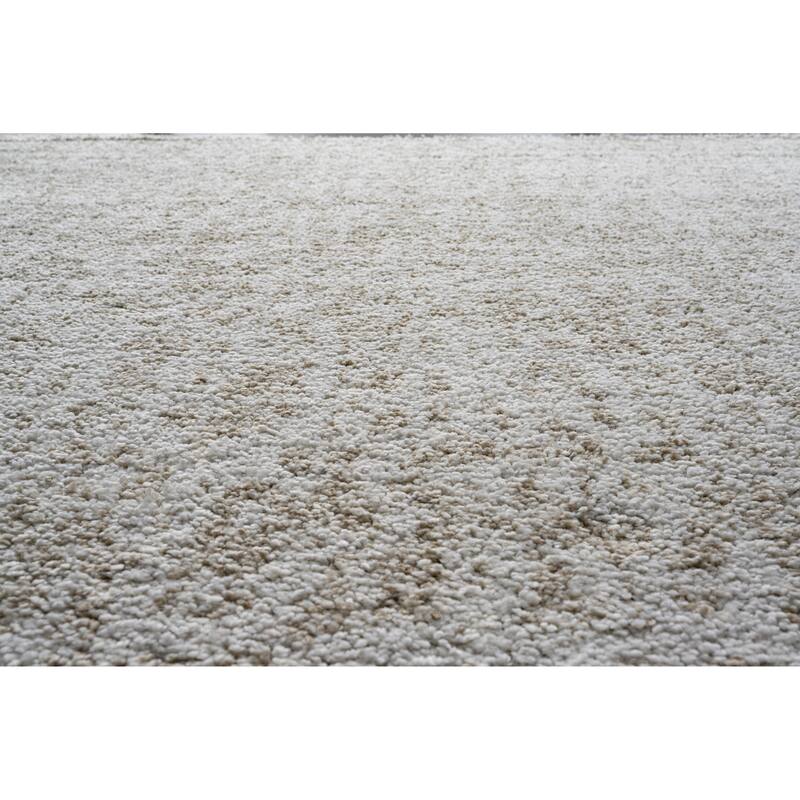 Matilda Ivory and Beige Polypropylene Area Rug - 9' x 12'
