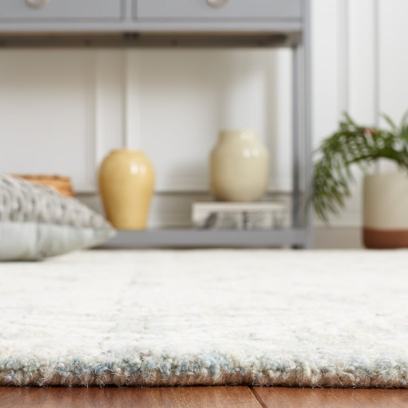 SAFAVIEH Handmade Ebony Fridbjorg Modern Wool Rug