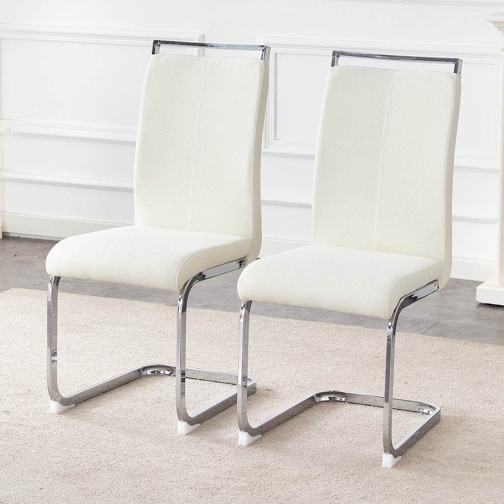 Luxury - style Dining Chairs.The combination of white grainy fabric-like fabric and silver metal legs is stylish.Set Of 2.
