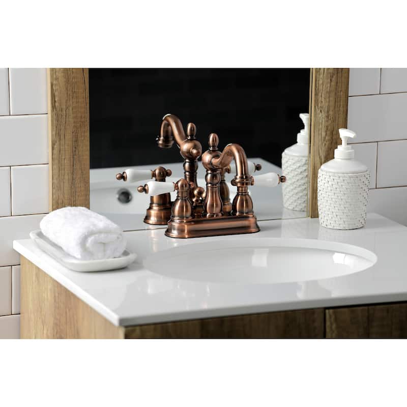 Kingston Brass Heritage Two-Handle 3-Hole Deck Mount 4 in. Centerset Bathroom Faucet