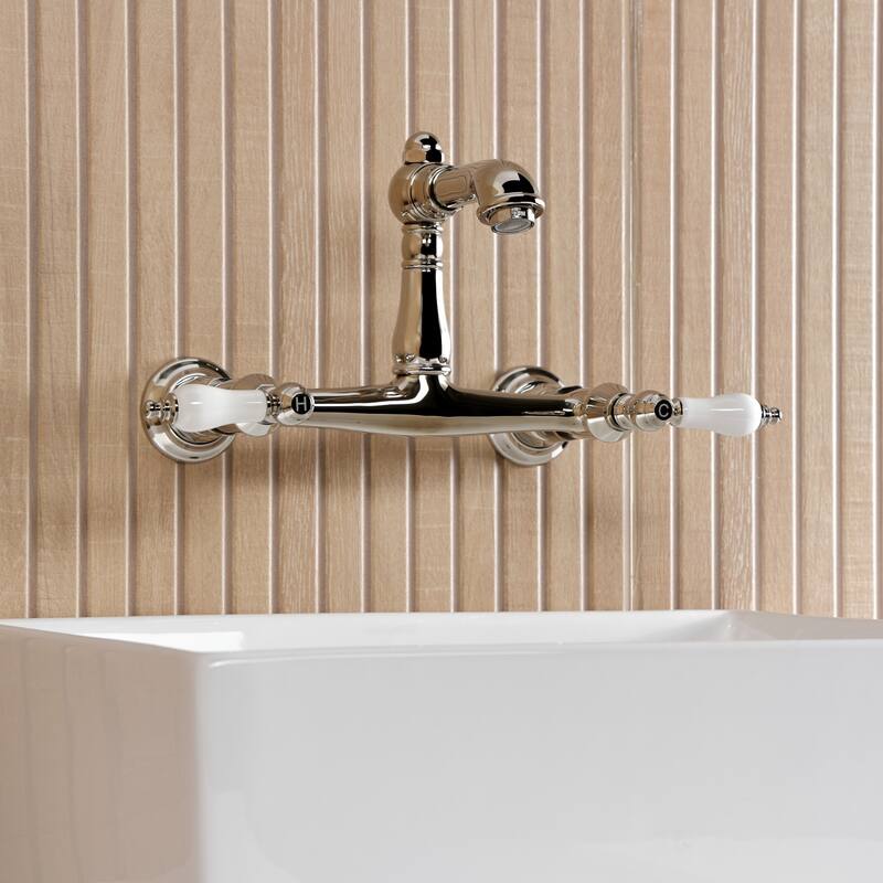 Kingston Brass English Country Two-Handle 2-Hole Wall Mount Bathroom Faucet