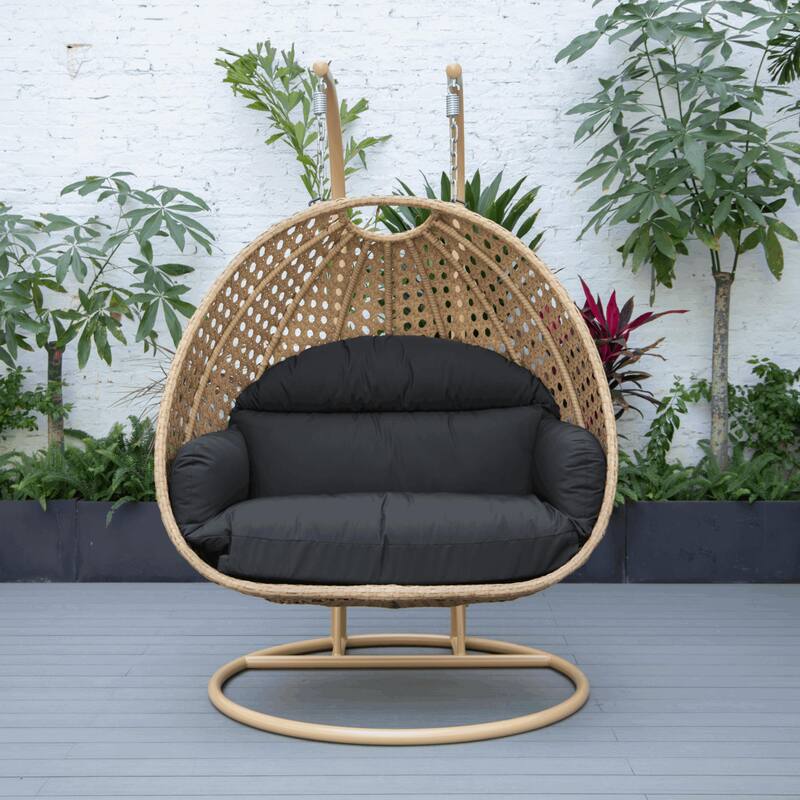 LeisureMod Mendoza 2-Person Hanging Egg Swing Chair - Handcrafted Light Brown Wicker, Patio Hammock Lounger with Cushions - 53"