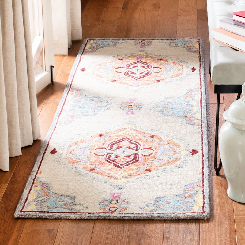 SAFAVIEH Handmade Micro-Loop Noeleen Wool Rug - 2'3" x 7' Runner - Beige/Orange