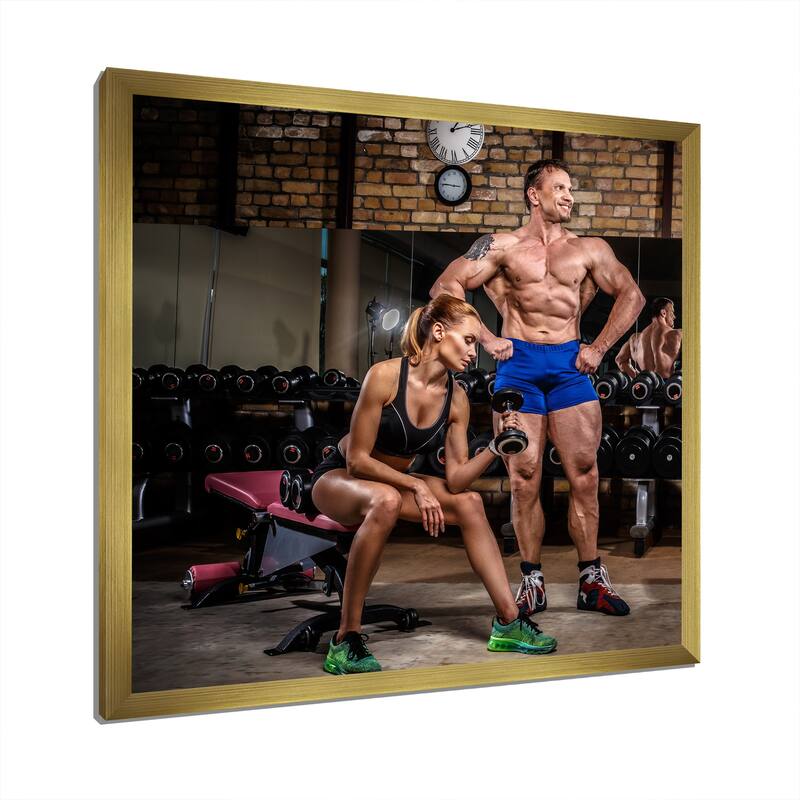 Designart "Sports Couple Is Working Out Gym" Aerobic & Bodybuilding Framed Canvas Prints