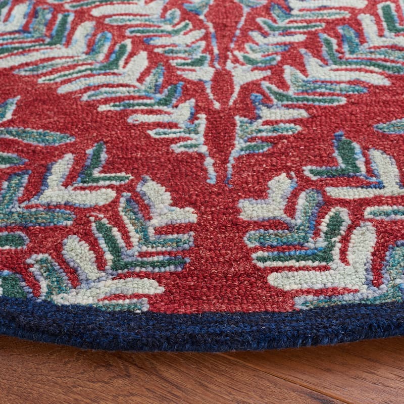 SAFAVIEH Handmade Capri Ilianka Wool Rug