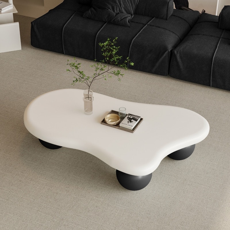 47 Inch Cloud Shaped Coffee Table with 3 Ball Legs for Living Room - White Black