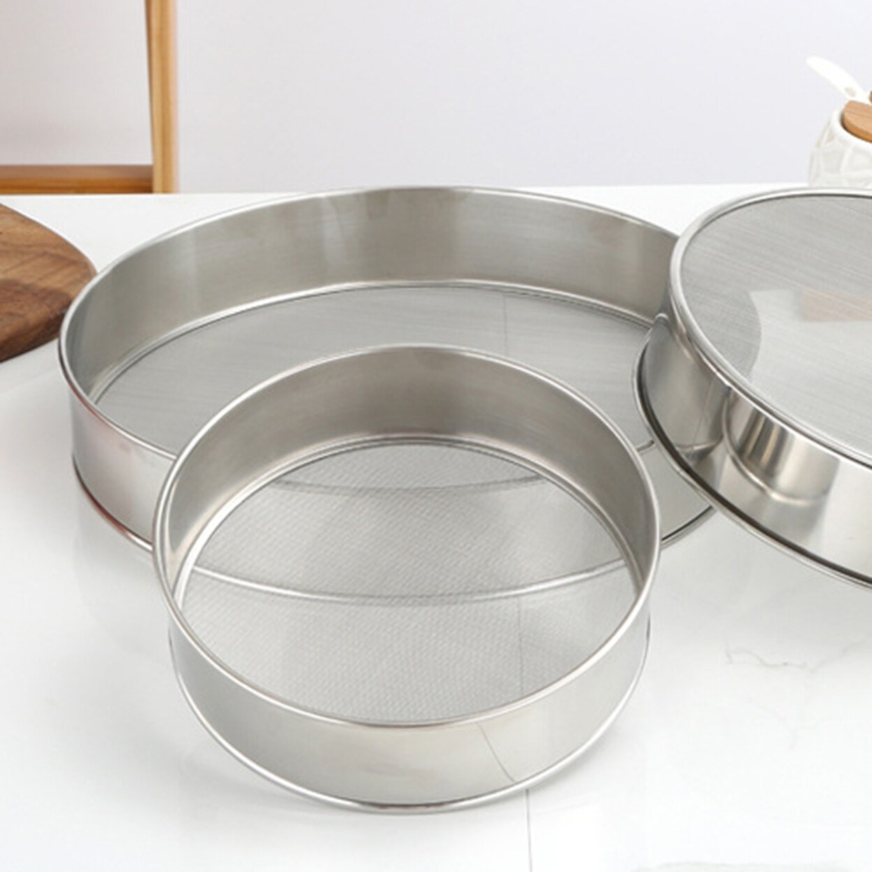 https://ak1.ostkcdn.com/images/products/is/images/direct/17473dbdf420020b38d628e5cf25fdf9a6696c1a/Flour-Sieve-RustProof-MultiFunctional-Stainless-Steel-Baking-Cooking-Flour-Mesh-Sifter-Household-Supplies.jpg