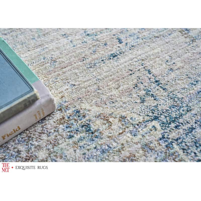 The Met X Exquisite Rugs Vintage Looms Beige/Blue Area Rug.