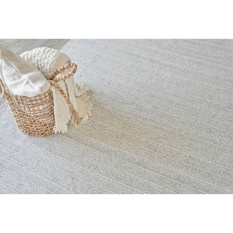 Nova Indoor/Outdoor Flatweave PET yarn Ivory Area Rug.