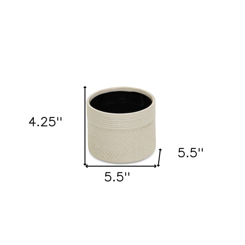 HomeRoots Off White Ceramic 42 Ounce Dotted Round Distressed Pot Planter - 5.50 in. x 4.25 in. x 5.50 in.