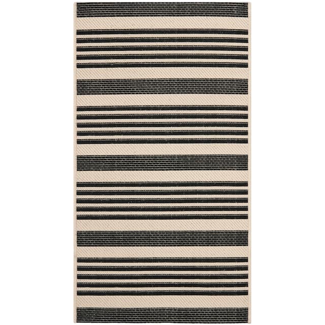 SAFAVIEH Courtyard Charmaine Indoor/ Outdoor Waterproof Area Rug - 2' x 3'7" - Black/Bone