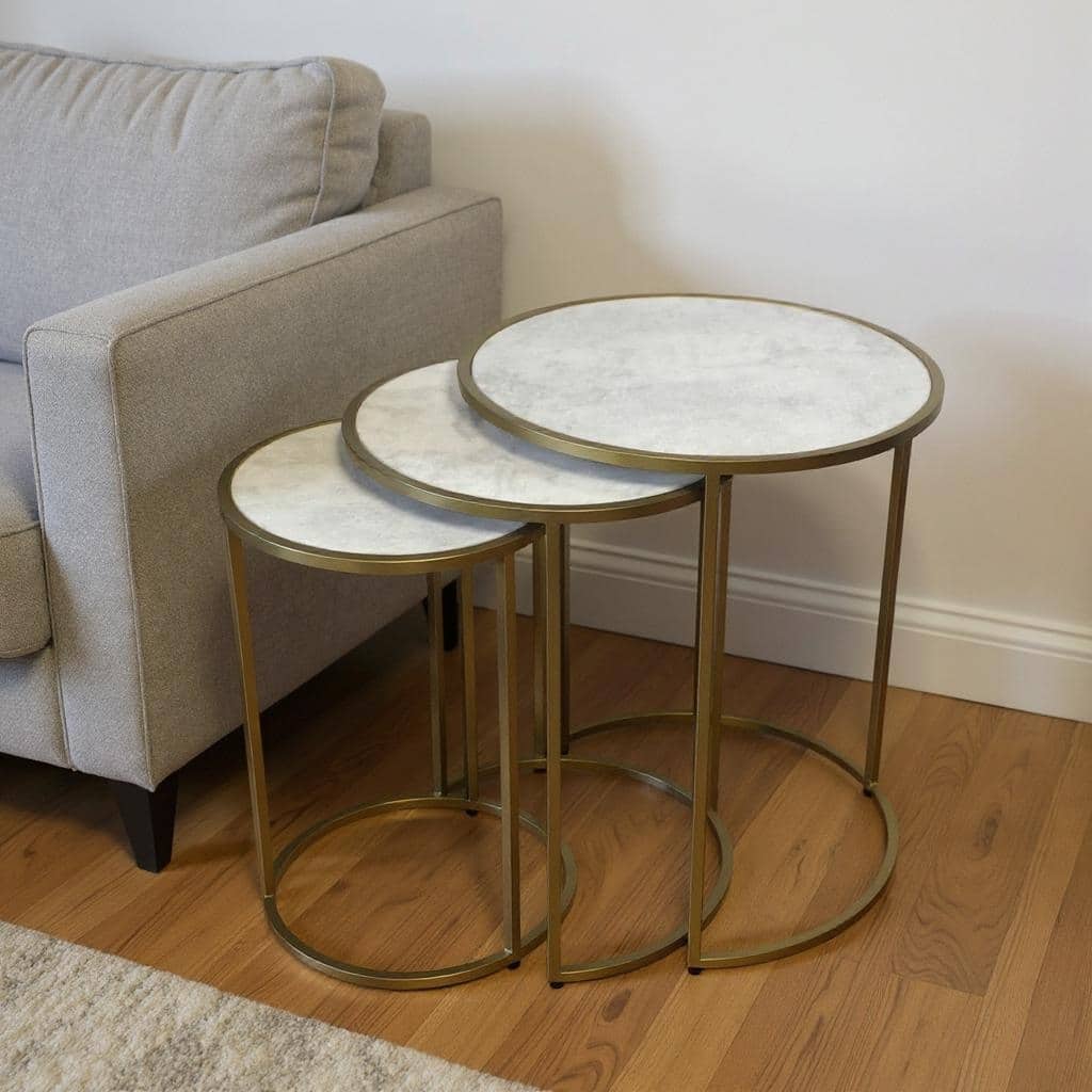 HomeRoots Set of Three White and Antiqued Gold Marble and Iron Round Frame Nested Tables - 17.5 in. x 22 in. x 17.5 in.