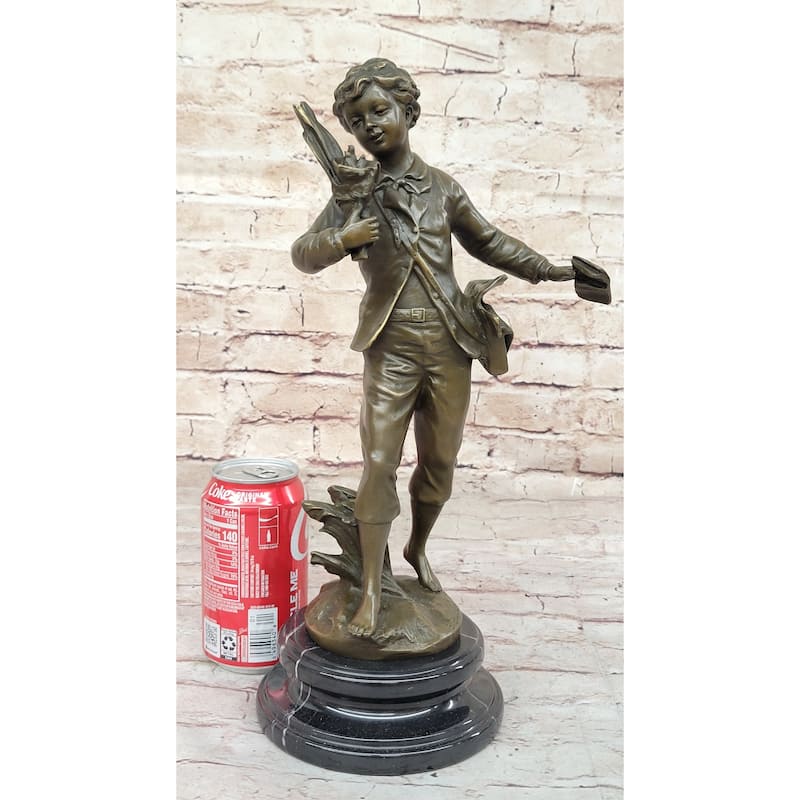 Young School Boy Carrying Supplies - 19Th Century Reproduction Sculpture After Bruchon