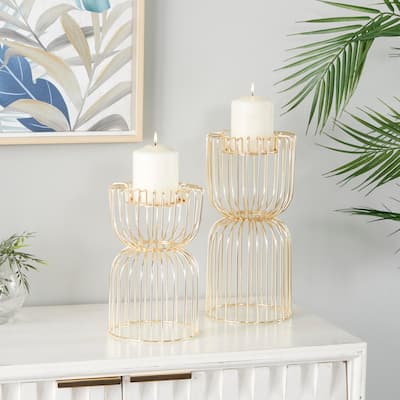 CosmoLiving by Cosmopolitan Gold Metal Pillar Candle Holder (Set of 2) - 6 x 6 x 13 Round