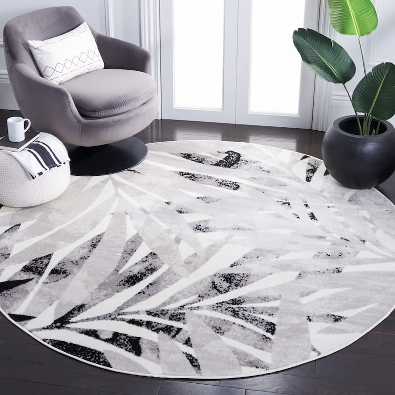 SAFAVIEH Skyler Leanna Distressed Tropical Watercolor Rug - 6'7" Round - Ivory/Black
