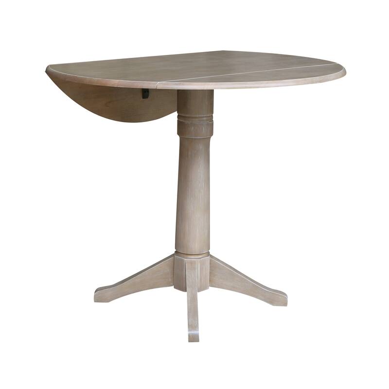 42 in. Round Top Dual Drop Leaf Pedestal Dining Table