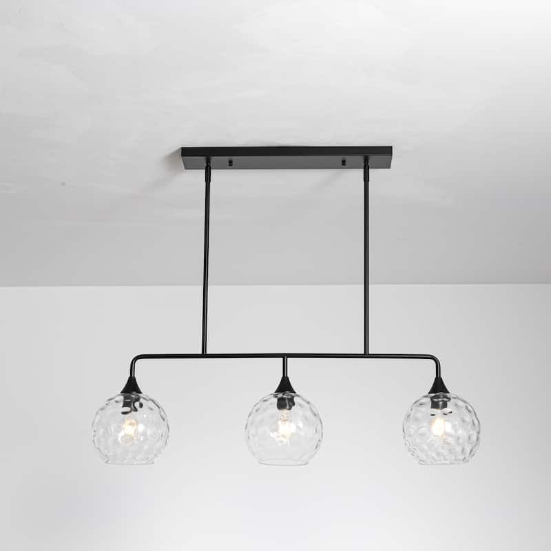 3-Light Modern Black/Brushed Gold Linear Chandelier for Kitchen Island with Clear Textured Glass Globe Shades - Black/Clear